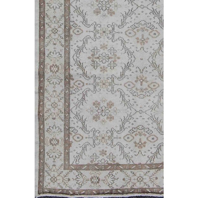 Vintage Turkish Oushak Carpet with Ivory Ground and Repeating Floral Design. Keivan Woven Arts / circa/1940 rug/ EN-140436...