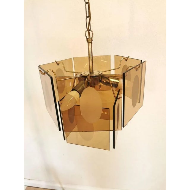 Mid-Century Chandelier in Smoked Glass from Vistosi, 1960s, in None conditions. Designed 1970 to 1979 European Plug (up to...