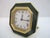 Cartier Paris octagonal desk or travel alarm clock featuring a gold-gilt and green enamel frame. Swiss made with...