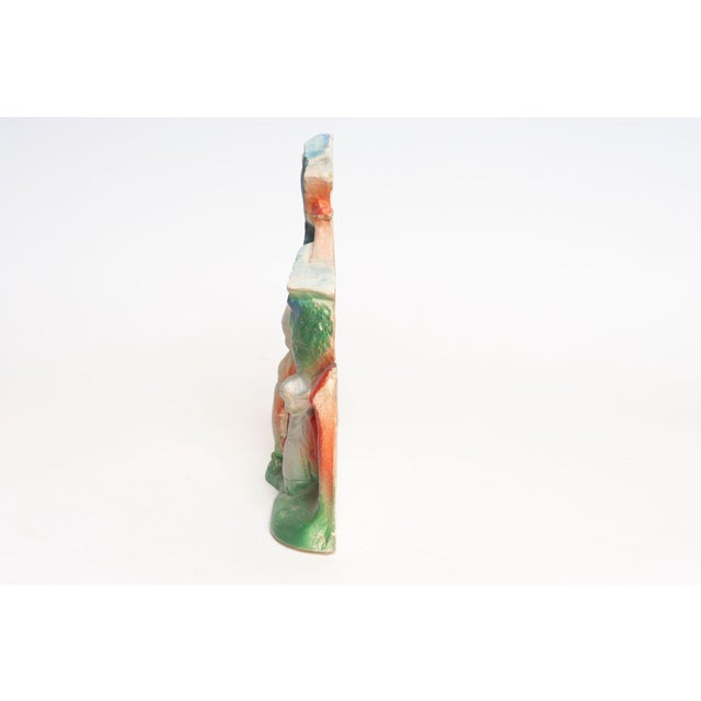 Circa 1970s/80s American painted chalkware windmill with children, a boy and girl, retrieving buckets of water made by an...