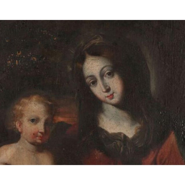 Early 17th century French School "Virgin and Child " Oil on canvas (Original canvas, restorations, gaps) 71.5 x 60.3 cm...