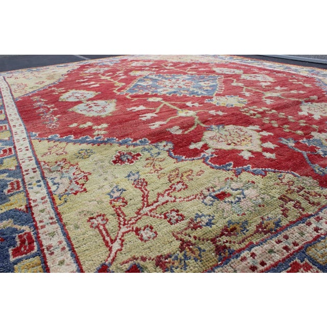 Early 20th Century Early 20th Century Antique Turkish Oushak in Yellow Green, Red & Blue With Floral Medallion Design For Sale - Image 5 of 7