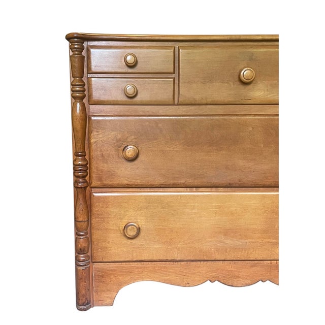 Stunning Virginia House three drawer dresser made with Maple wood. The first drawer has the appearance of multiple drawers.