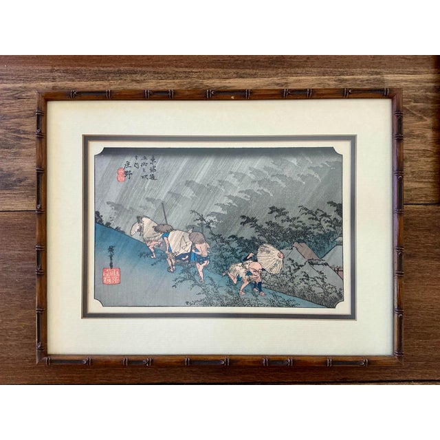 A beautifully presented pair of vintage Japanese woodblock prints after the celebrated ukiyo-e master Utagawa Hiroshige,...