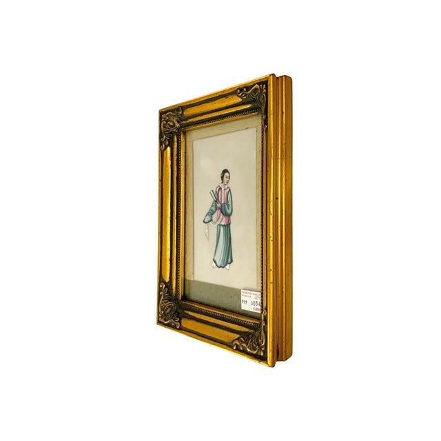The art is an antique 19th-century Chinese export painting featuring a female figure, housed in a gilt frame. This artwork...