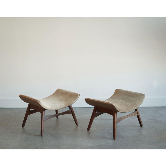 A stunning set of walnut stools designed by Mel Abitz for Galloway, circa 1960s, and beautifully restored by Stamford...