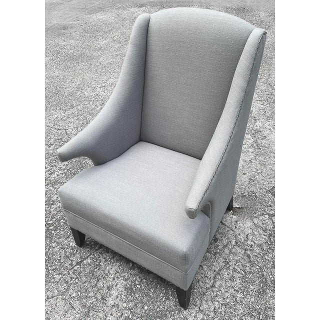 Vintage Grey midcentury style wingback chair with chrome decorative nail trimmed edges. No maker's marks. Seat measures:...