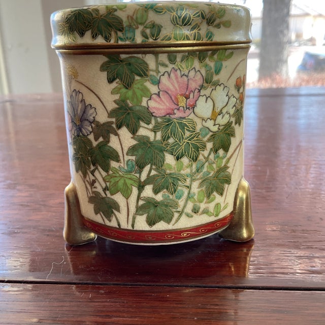 This is a nice, round antique Meiji Period (1868-1912) Japanese Satsuma Porcelain Enamel Tobacco Jar Circa 1880. The box...