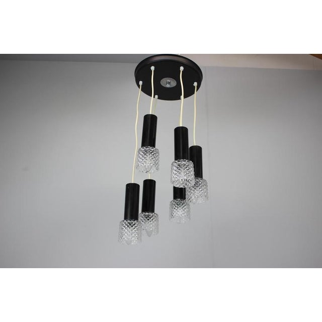 Exceptional vintage five-light pendant chandelier produced in Czechoslovakia in the 1970s. This striking Mid-Century...