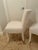 Gorgeous pair of soft and super comfortable slipper chairs or side chairs. They are lacquered in high gloss white and...