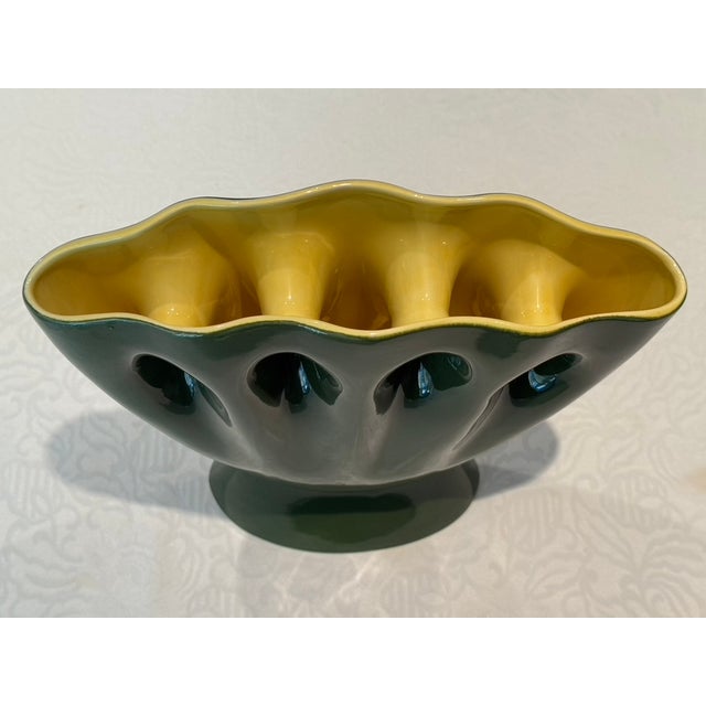 This is a unique and generously sized multi-neck vase by Red Wing Pottery. The colors are very vibrant and the vase is...