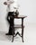 Oval two-tier mahogany side table in Rich Mahogany. Finished in rich mahogany, this oval two-tier mahogany side table is...