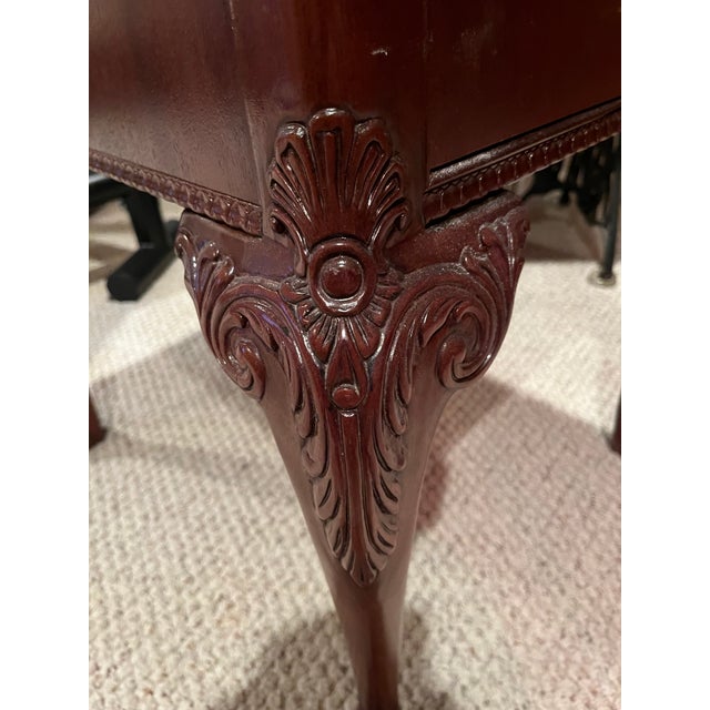 Wood inlaid side/end table with large drawer and ball and claw feet. Some scratches in the top but in very good condition....