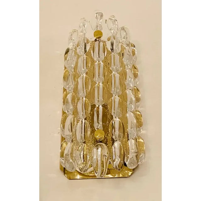 A set of 2 luxurious 1950s thick crystal bubble wall lights designed by Karl Fagerland for Orrefors. Rewired.