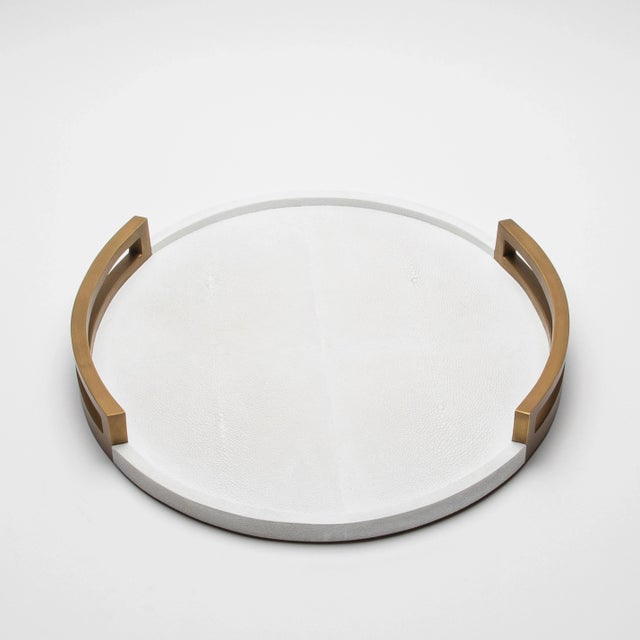 This round tray by R&Y Augousti is the epitome of opulence, where artistry and luxury converge in perfect harmony. The...