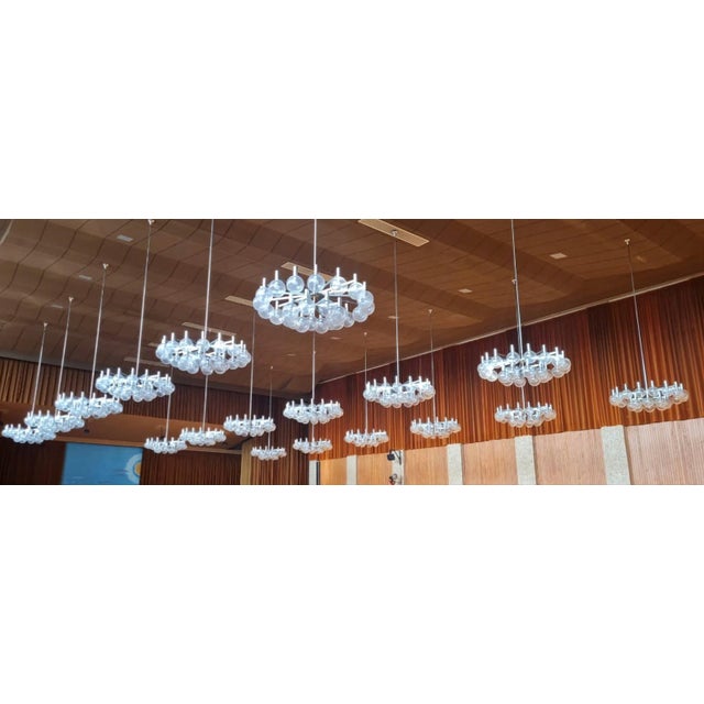 Gigantic Sputnik ceiling lamp with 24 hand-blown frosted glass spheres by Ott International from the 1960s. The lamp has a...