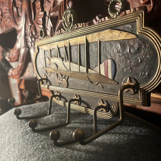 American Antique Judd Co. Cast Iron Airplane Themed Wall Rack For Sale - Image 3 of 12