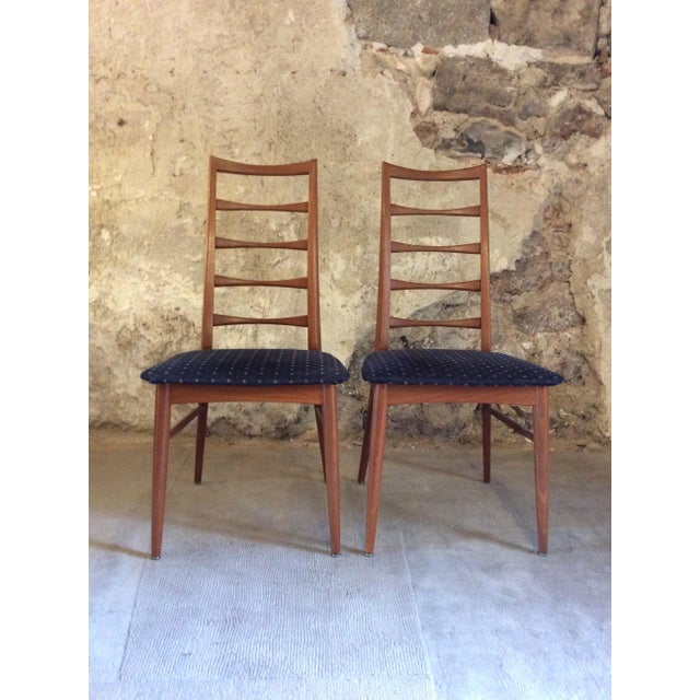 This set of two teak Lis chairs was designed by Niels Koefoed for Koefoeds Hornslet in Denmark. Surface has been restored....