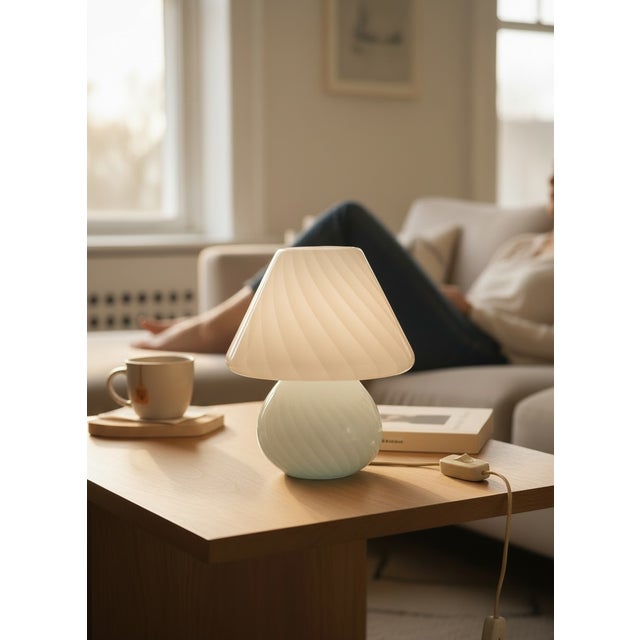 A beautiful vintage Venini Murano glass mushroom table lamp dating from the 1970s. The lamp is crafted in softly...