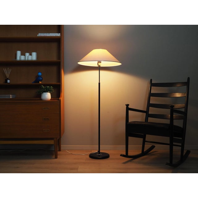 The rocking chair was made in the 1970s, Danish production. The structure is made of beech wood stained black. Wood after...