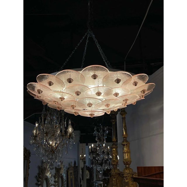 Gorgeous modern Murano glass pink disk flush mount chandelier. Beautiful textural element on the discs and pale pink is so...