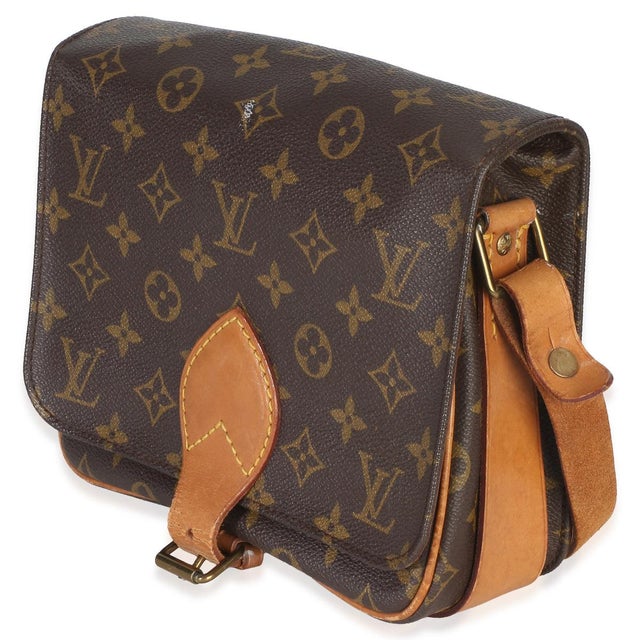 Item #: 153707 Interior Material: Canvas Size: 25 Features Interior: Two gussets. Dimensions: 9.5 x 8.5 x 3 in Handbag...