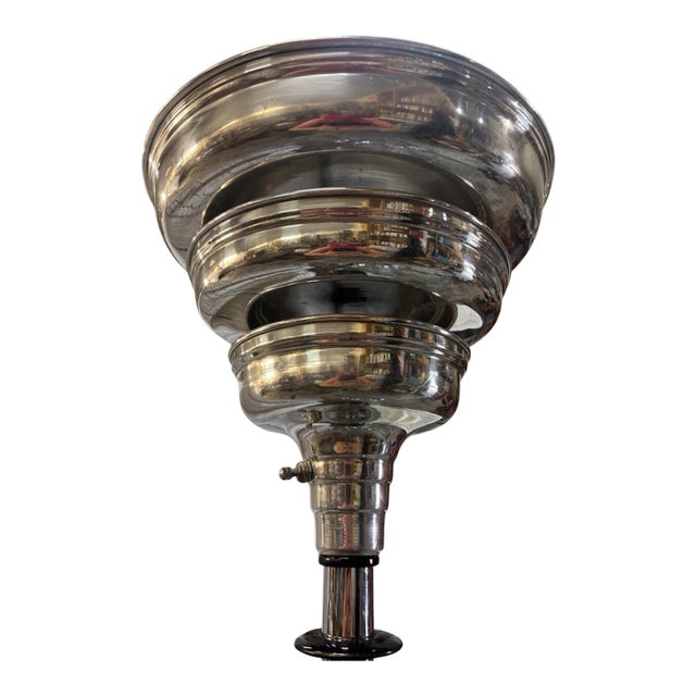This pair of Art Deco torcheres from the 1940s exudes elegance and vintage charm. The corded electric lamps feature a...
