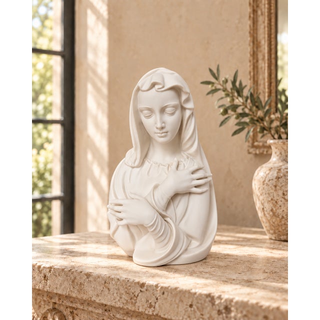 An elegant signed porcelain Madonna by Edward Marshall Boehm of Trenton, New Jersey. Rendered in fine matte white bisque...