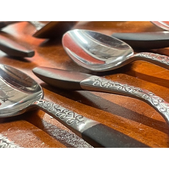 A distinctive and sought-after set of Mid-Century Modern flatware for the collector or design enthusiast. "This attractive...