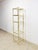 This glamorous brass and glass 5-tier shelf is a dazzling vintage Hollywood Regency and mid-century modern treasure. The...