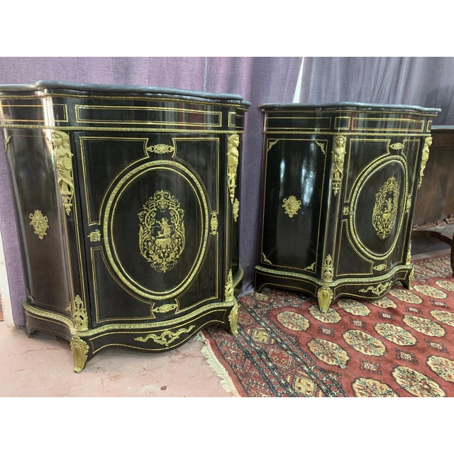 pair of French sideboards in Napoleon III style, 19th century This piece is attributed to the mentioned designer/maker. It...