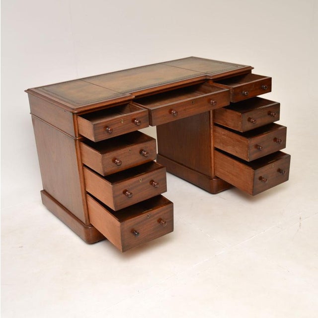 A superb antique Victorian period pedestal desk. This was made in England, it dates from around 1860-1880. It is of...