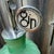 Vintage Green Decanter Bottles With Metal Siphon Discs and Monogram Discs - Set of 3 For Sale - Image 4 of 9