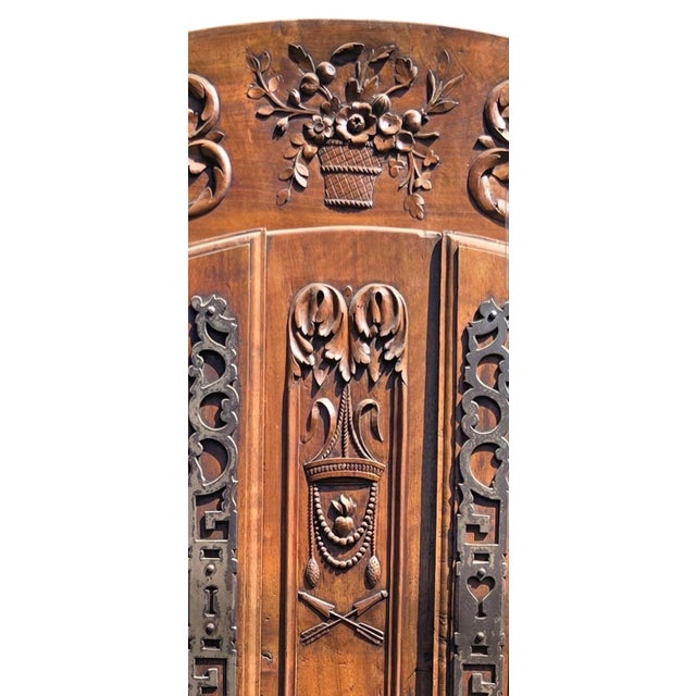 This piece is an exquisite French Louis XV period dome-topped bibliothèque (circa 1750), masterfully hand-carved from...