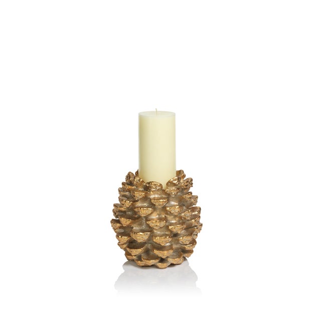 Bring the feel of winter and the holidays to your tabletops with this gold pine cone candle holder. Illuminate your themed...