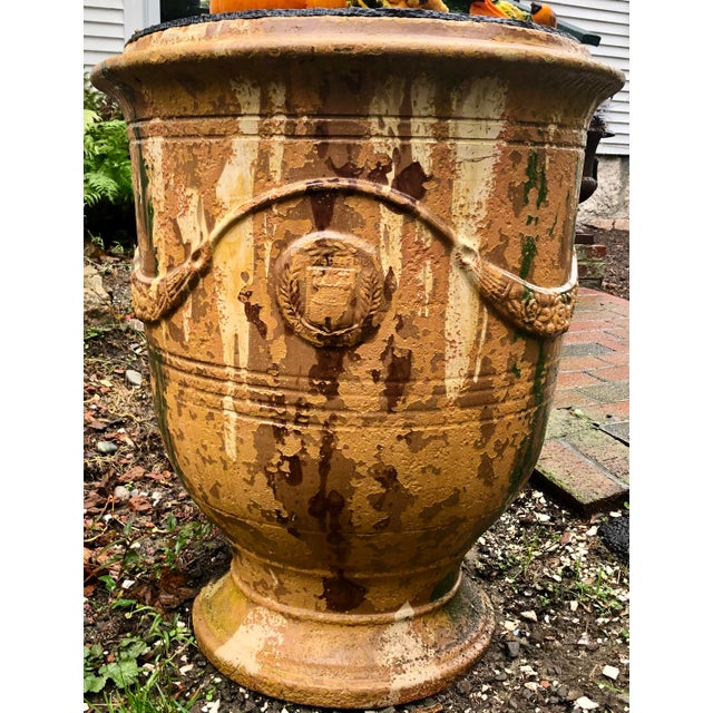 Pair of Anduze Urns with antique finish "flammé. Stunning for an interior entryway or garden to add French flair and...