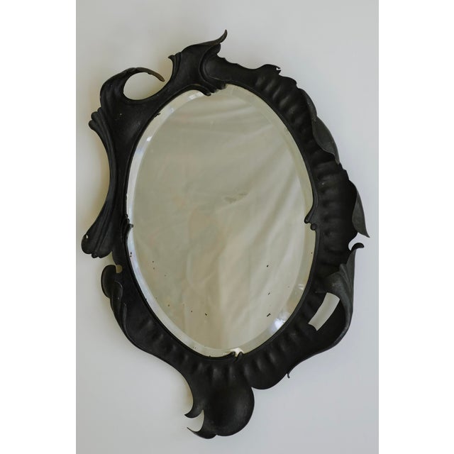 Stunning Early 20th Century Swedish Wrought Iron Wall Mirror. Beautiful frame in wrought iron to look like a leaf...