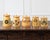 Charming 19th-century French terracotta pottery vessels, each finished in a warm ochre-yellow glaze and decorated by hand...