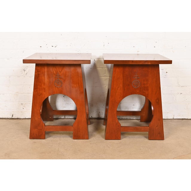 A gorgeous pair of Mission or Arts & Crafts style Roycroft solid cherry wood tabourets or side tables By Stickley USA,...