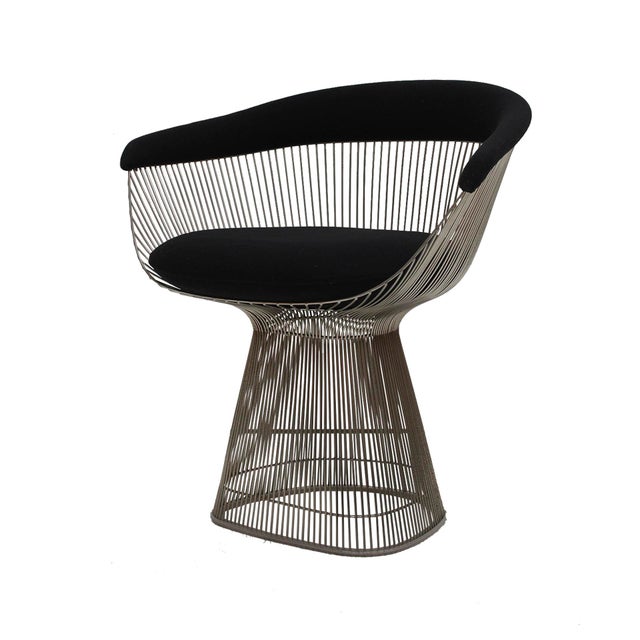 Set of 2 chairs designed by warren platner between 1968 and 1970, featuring a chrome-plated steel structure and dark wool...