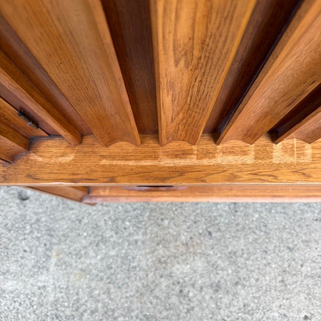 This is an amazing Thomasville tall boy dresser. It features a walnut body, 6 large drawers, and rosewood embellishments...