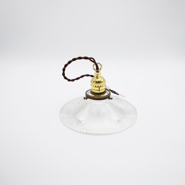 We offer this Holophane Clear Glass Vintage Industrial Pendant Light. Prismatic glass shades in excellent condition. The...