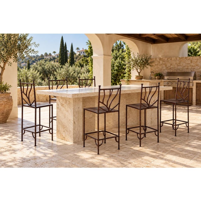 Set of 2 Spanish Revival Hand-Forged Wrought-Iron Barstools, Mexico, circa 1990 A distinctive set of 2 custom-made...