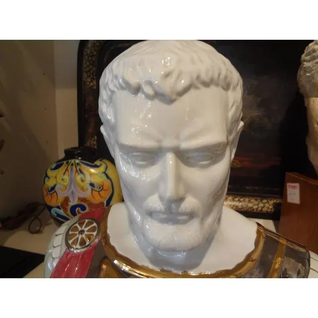 Fabulous well detailed 1940s Italian ceramic bust sculpture of a Classical Roman with unusual iridescent glaze. This large...