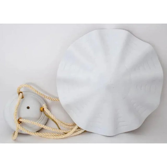 This pendant ceiling light is a stunning example of design inspired by the distinctive Serge Roche style. The centerpiece...