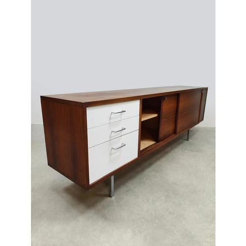 Period: 1970. Most likely by Cees Braakman for Pastoe. Its sleek lines and beautiful wood grain make it truly beautiful....