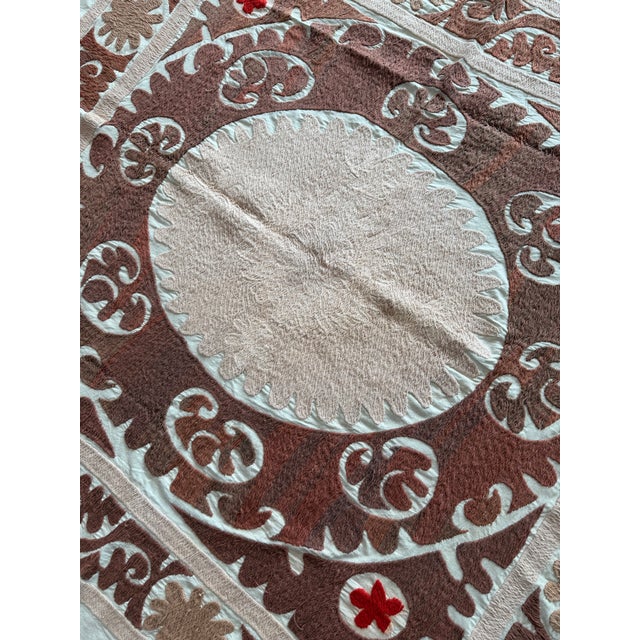 Vintage Suzani from Asian, circa 1960s. Dimension; 52'' x 55'' inches / 133 x 140 cm / 4'4'' x 4'7'' Material: 100%...