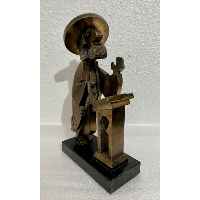 Rare Vintage unusual piece. In this bronze or metal sculpture by Frank Meisler, the artist recreates a Rabbi at prayer....