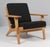 Hans J. Wegner lounge chair made of solid soap treated oak. New upholstered with Hallingdal 180 wool from Kvadrat. Model...