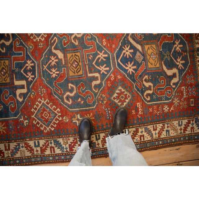 :: Triple oversize center medallions each bearing cloudband stylized ribboned floral design motifs atop a field covered in...